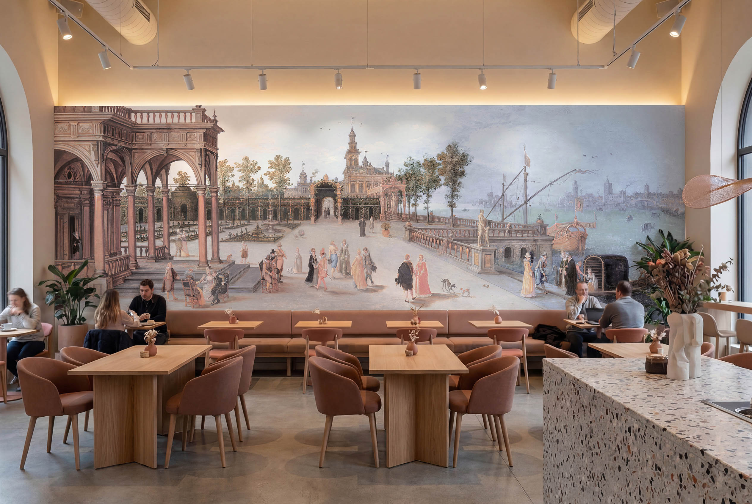 Musee | Venetian Soiree Wall Mural Musee custom wall mural featuring a digitally restored historical classical painting of an elegant dancing party in a Renaissance palace forecourt with a Capriccio view of Venice.