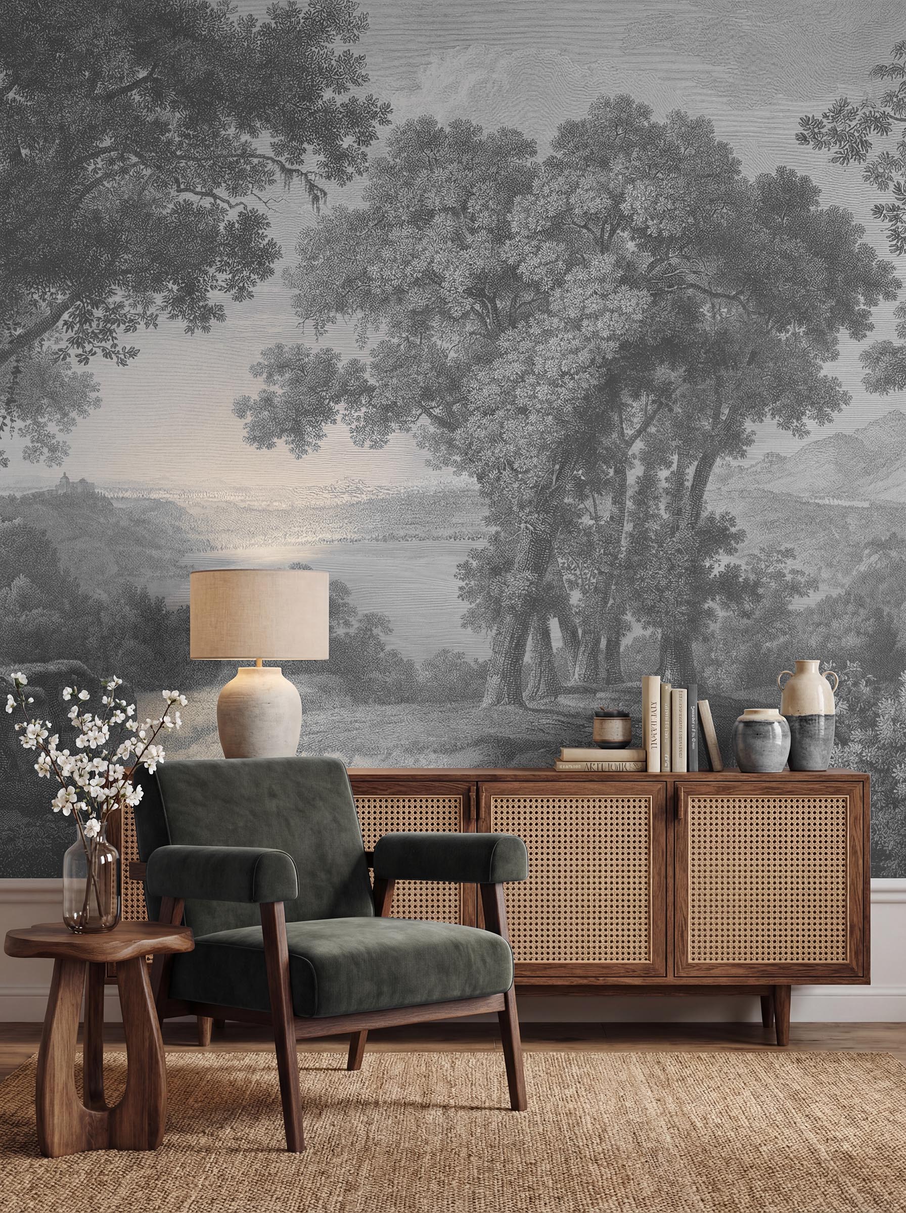 Musee | Heritage Grove Wall Mural Musee custom wall mural featuring a high-definition restoration of a classic monochromatic landscape engraving by Wilhelm Friedrich Gmelin, showing large trees and a distant lake.