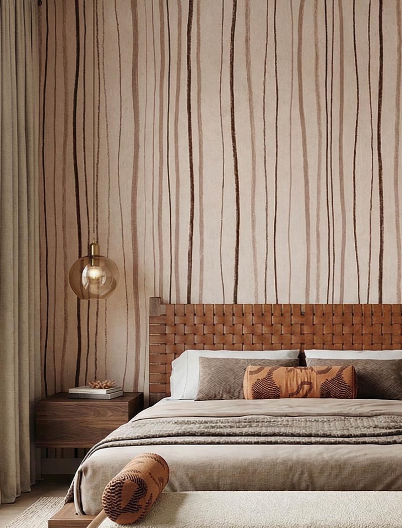 Organic hand-drawn vertical lines custom wallpaper mural in warm muted beige tones. "Artisan Lines" minimalist bedroom bespoke wallcovering in the UAE.