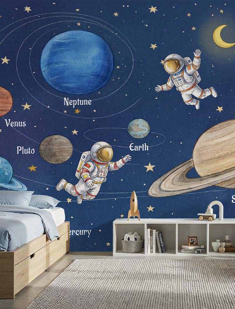 Artistic solar system and little astronauts custom wallpaper mural on a rich dark blue background. "Little Astronaut's Journey" sophisticated kids bedroom wallcovering in the UAE.