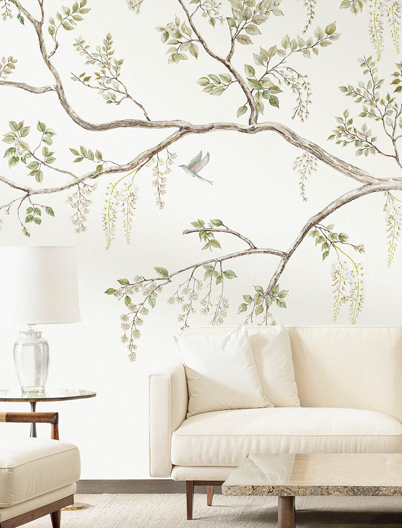 Elegant Chinoiserie wisteria tree branch custom wallpaper mural with soft green leaves. "Wisteria Whispers" refined minimalist wall design in Dubai and the UAE.